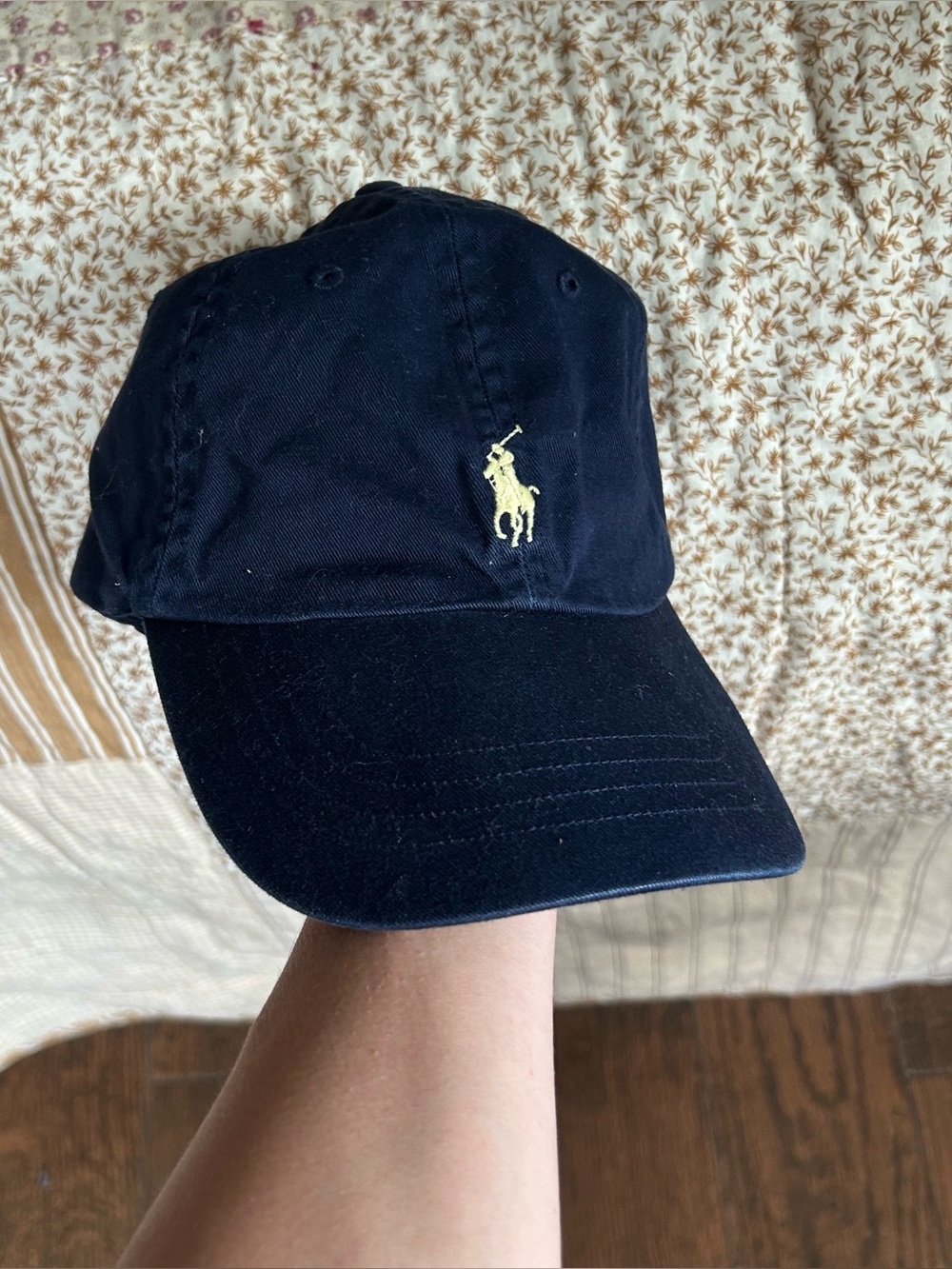 Navy polo Ralph Lauren hat with yellow detail